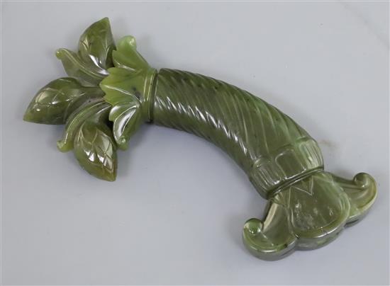 A Mughal spinach jade dagger handle, 5.75in.